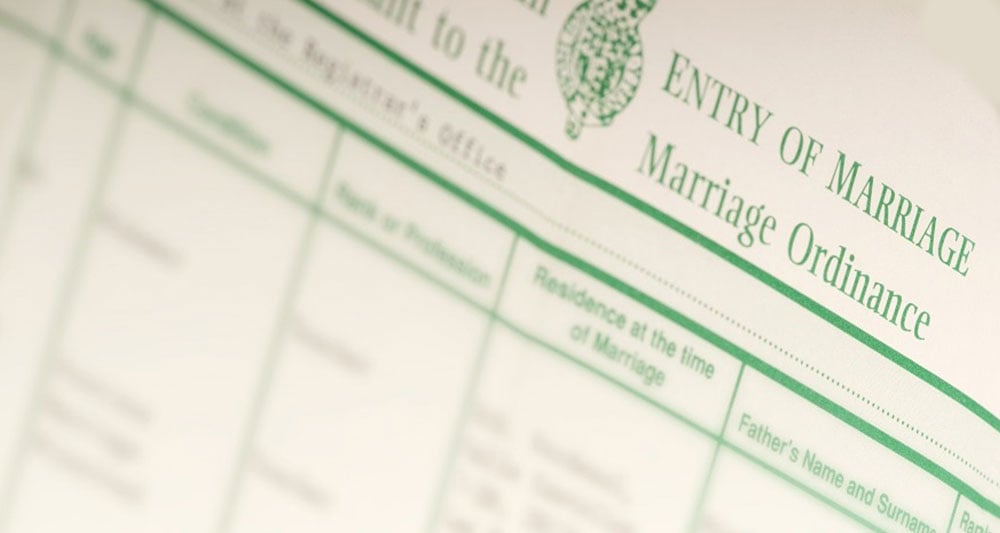 British-marriage-certificate-showing-headings-with-details-blurred-out